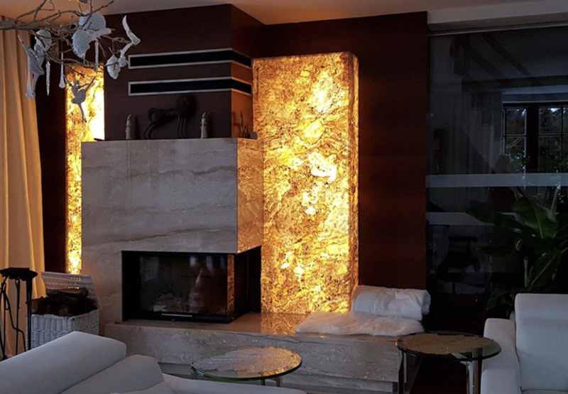 Flexible LED light sheet used behind translucent stone fireplace walls